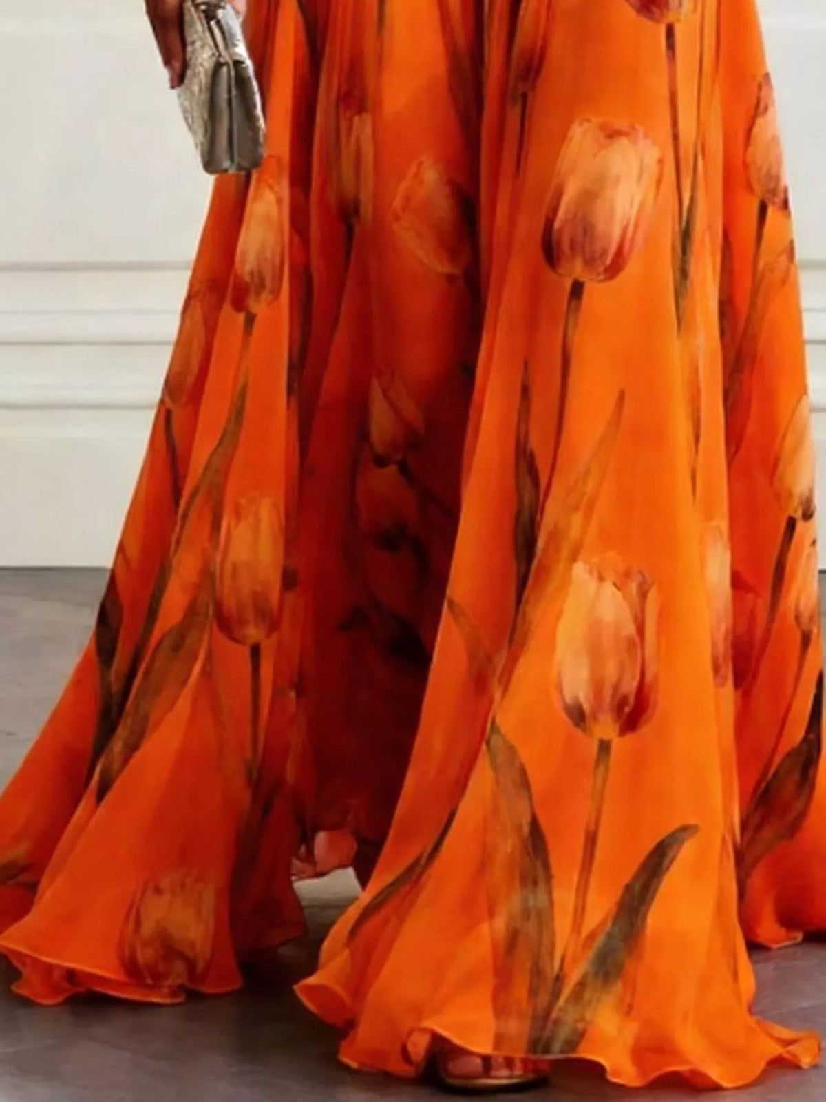 Sleeveless floral print ruched maxi dress in orange with flowing floor-length skirt