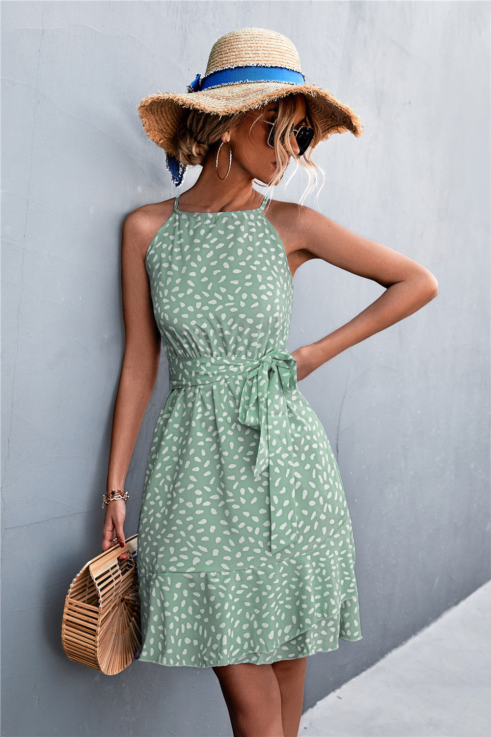 Gum leaf green tie-waist sleeveless dress, white speckle print, ruffle hem