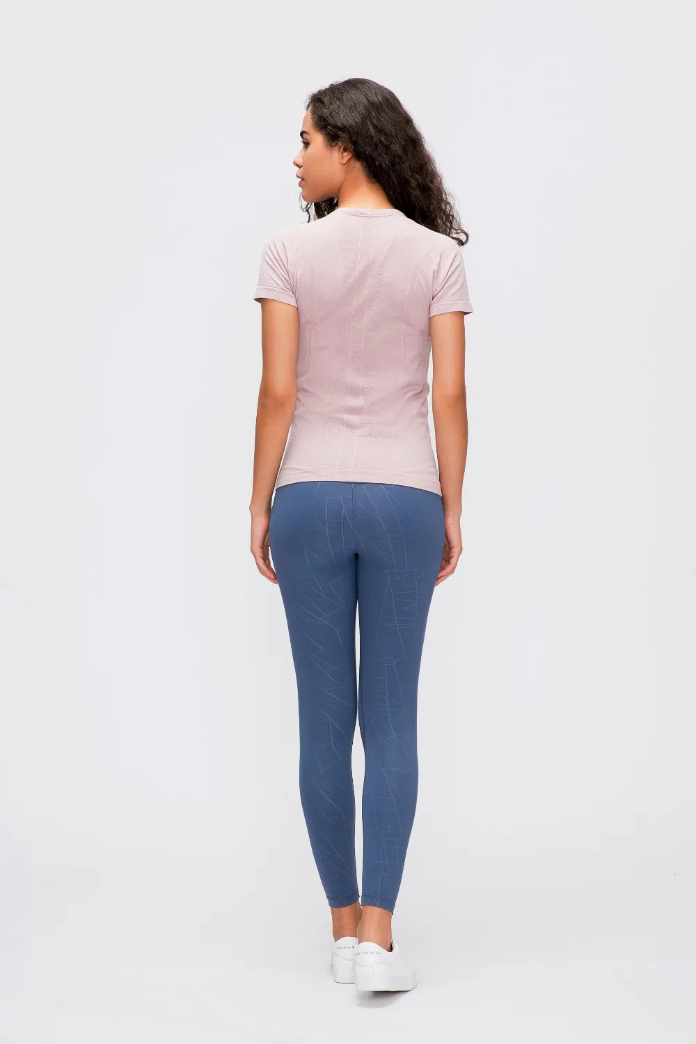 Dusty pink round-neck short-sleeve active t-shirt, back view.
