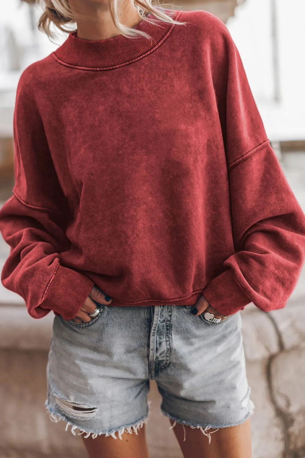 Deep red mock-neck dropped-shoulder sweatshirt with ribbed hem and cuffs