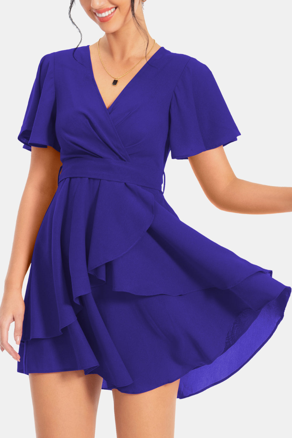 Royal blue surplice neck flutter sleeve dress with gathered waist and layered ruffle skirt
