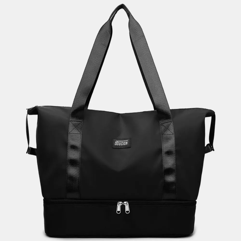 Black nylon tote duffel bag with wide straps and front zipper pocket