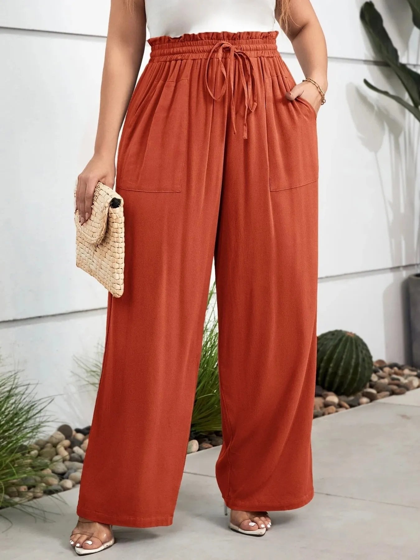 Rust high-waist wide-leg drawstring pants with stitched front pockets
