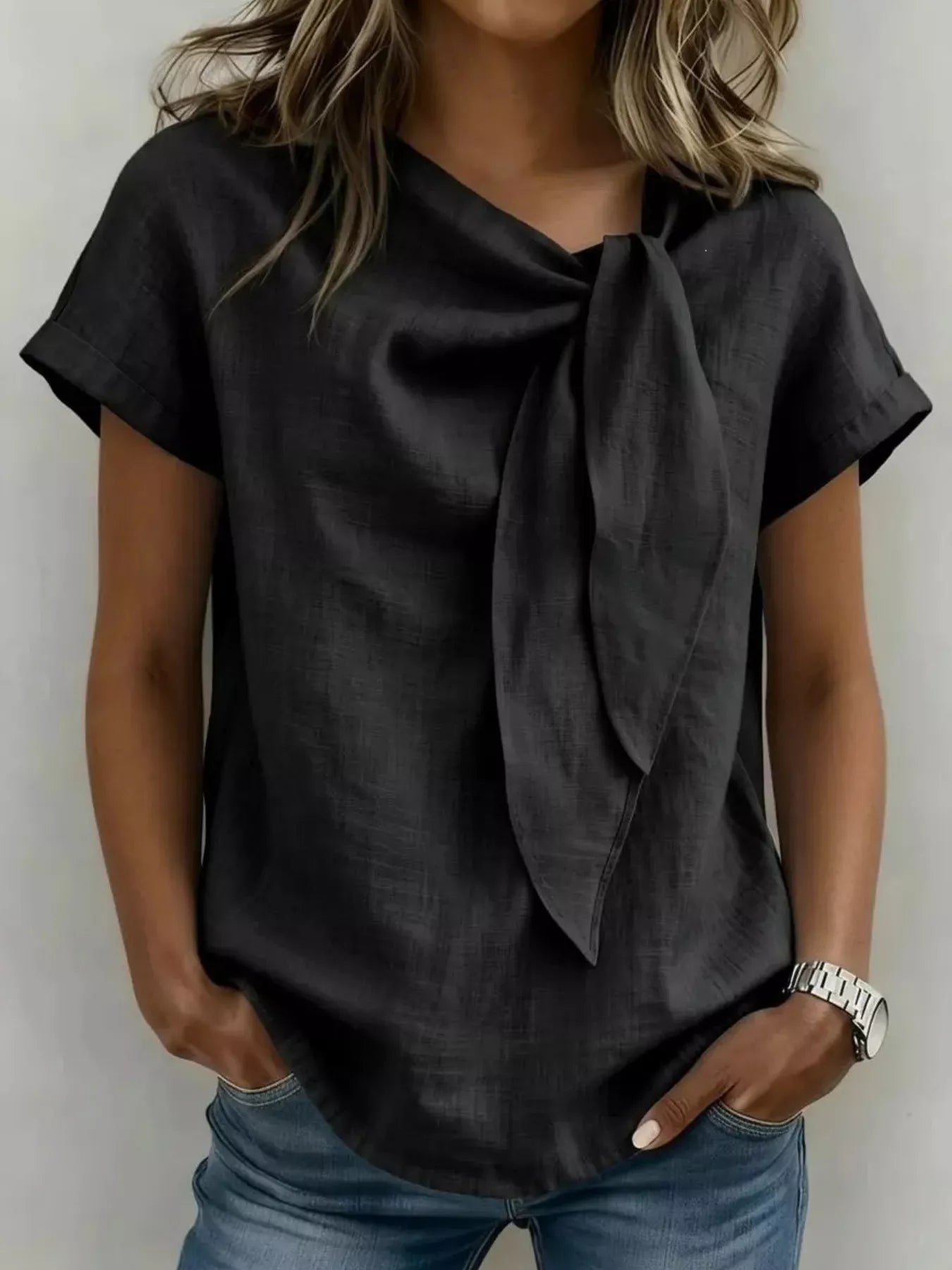 Black bow-tie neck short-sleeve blouse with soft knot at neckline