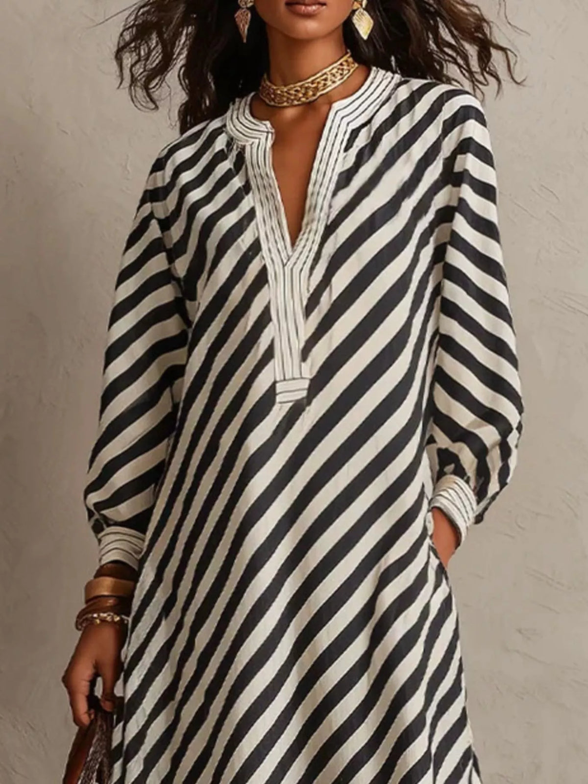 Black-and-white striped maxi dress, long sleeves, V-neck button front