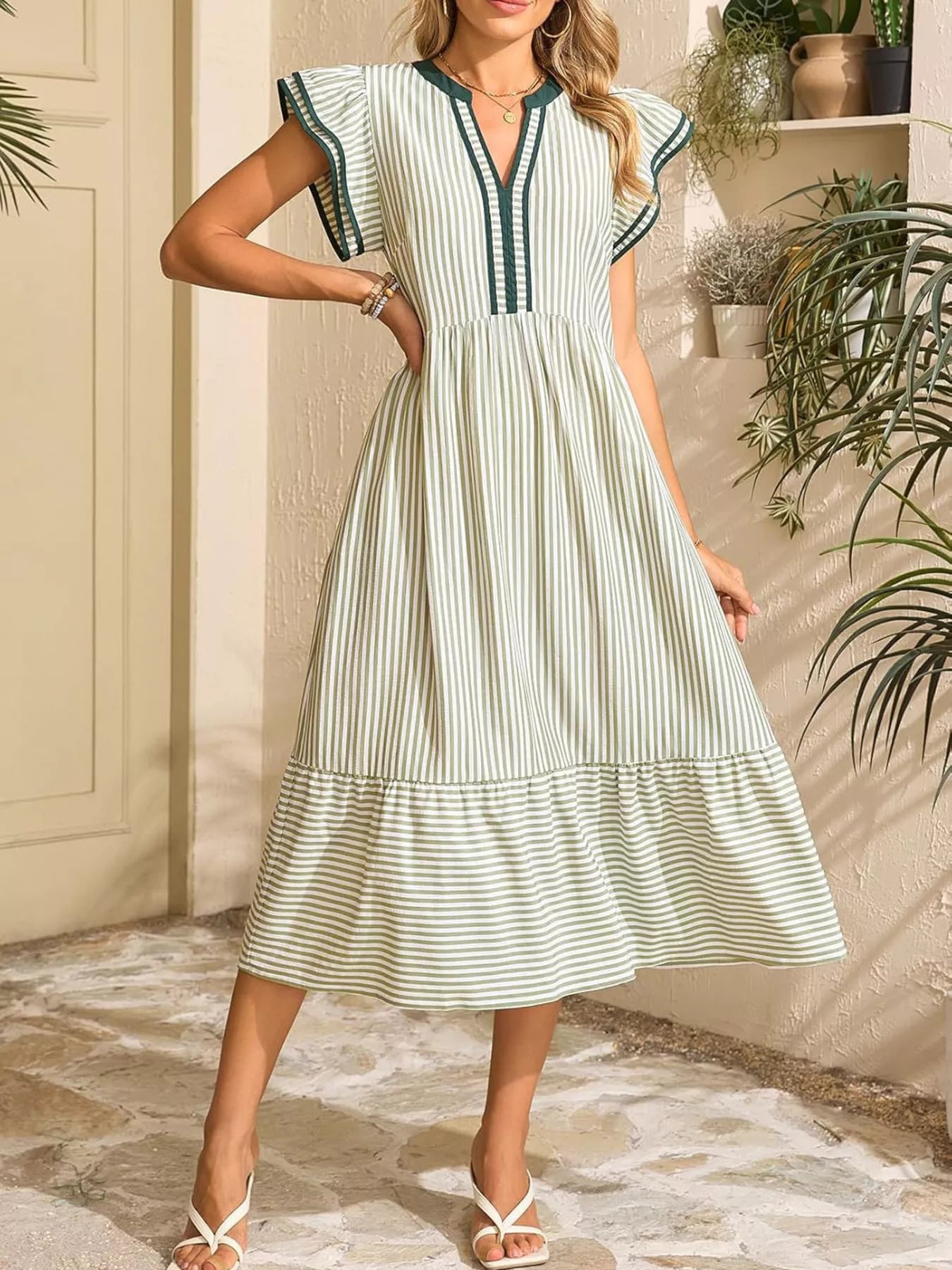Green-and-cream striped midi dress with ruffle cap sleeves and V-neck trim