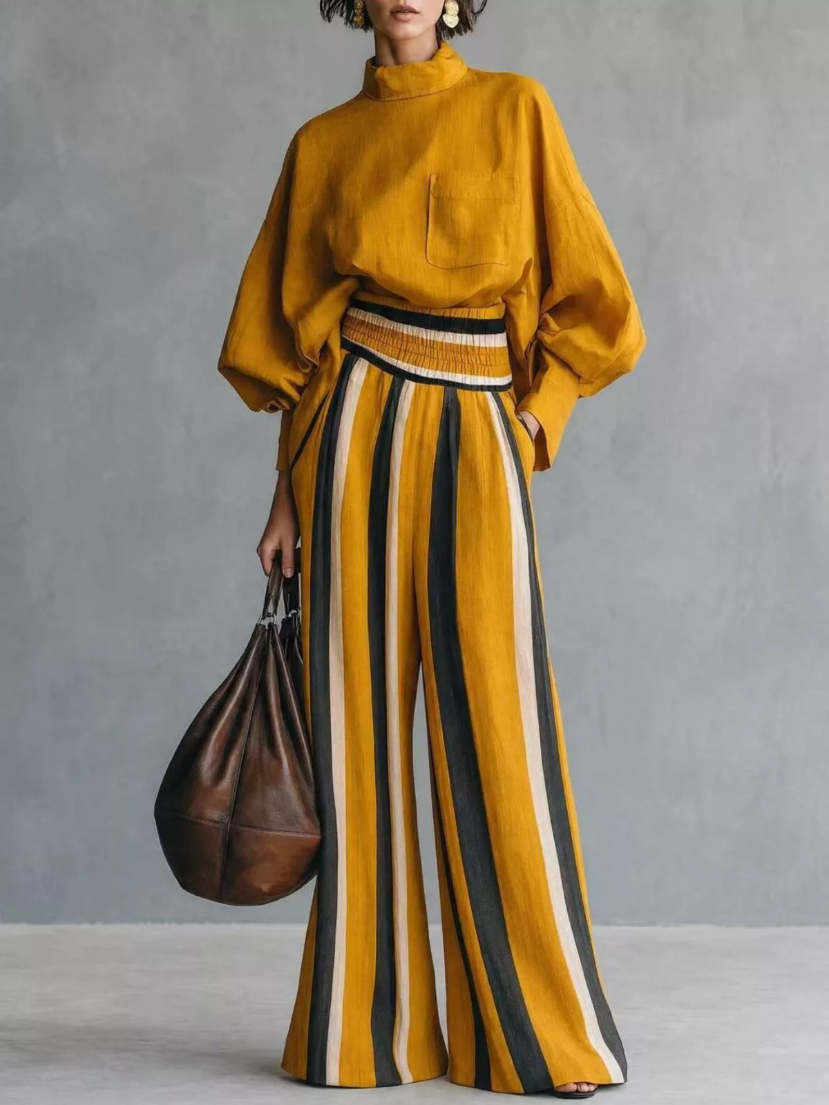 Mustard mock-neck top and vertically striped wide-leg pants two-piece set