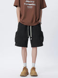 Men's black cargo drawstring shorts with side pockets and utility cargo flaps