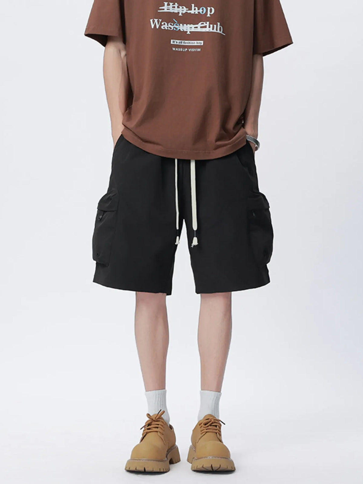 Men's black cargo drawstring shorts with side pockets and utility cargo flaps