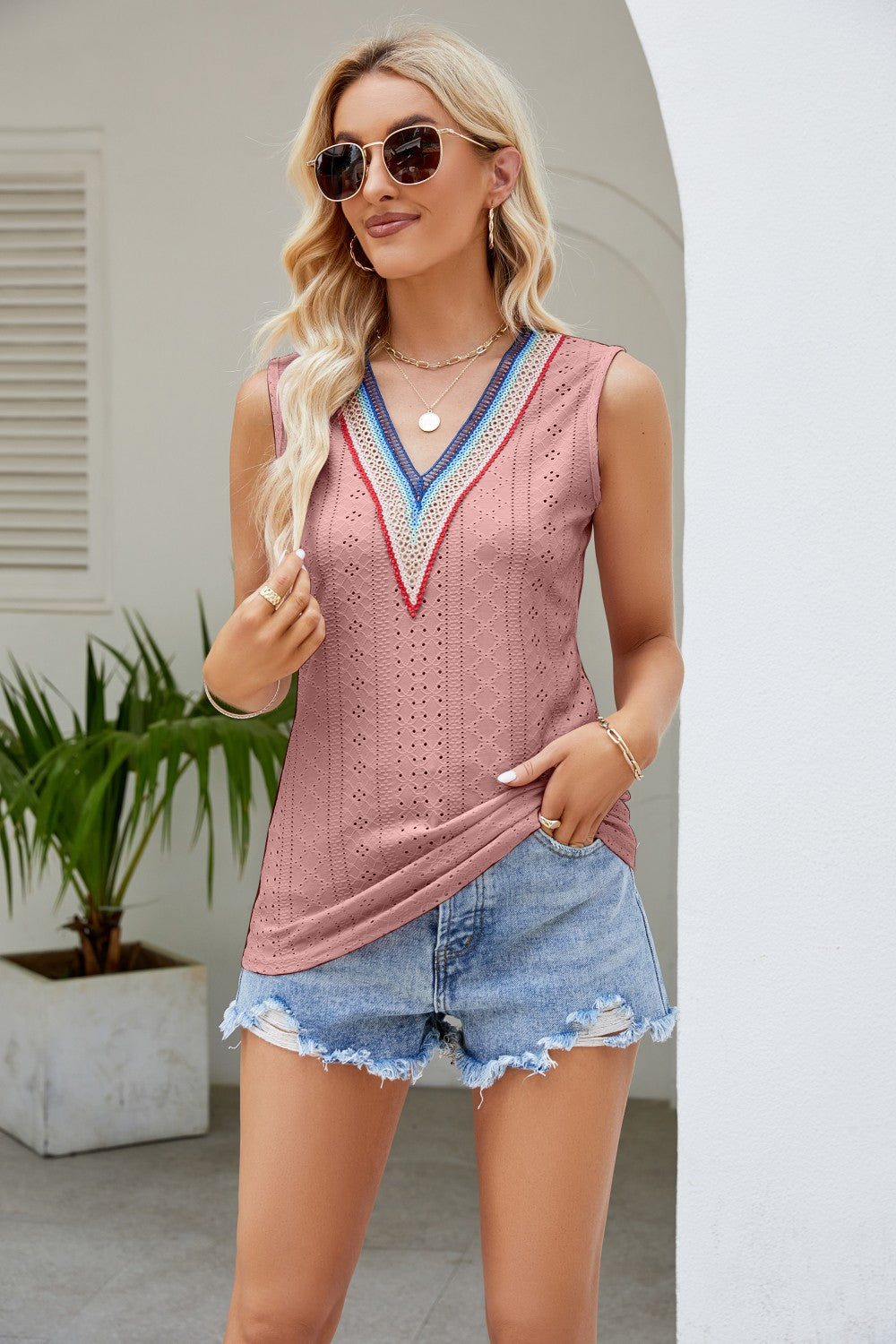 Dusty pink eyelet V-neck tank top with contrast trim, sleeveless design