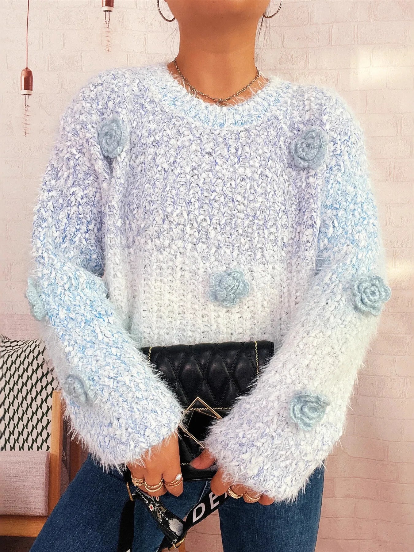 Flower-embellished round-neck sweater, fuzzy light blue knit with pale blue rosette details