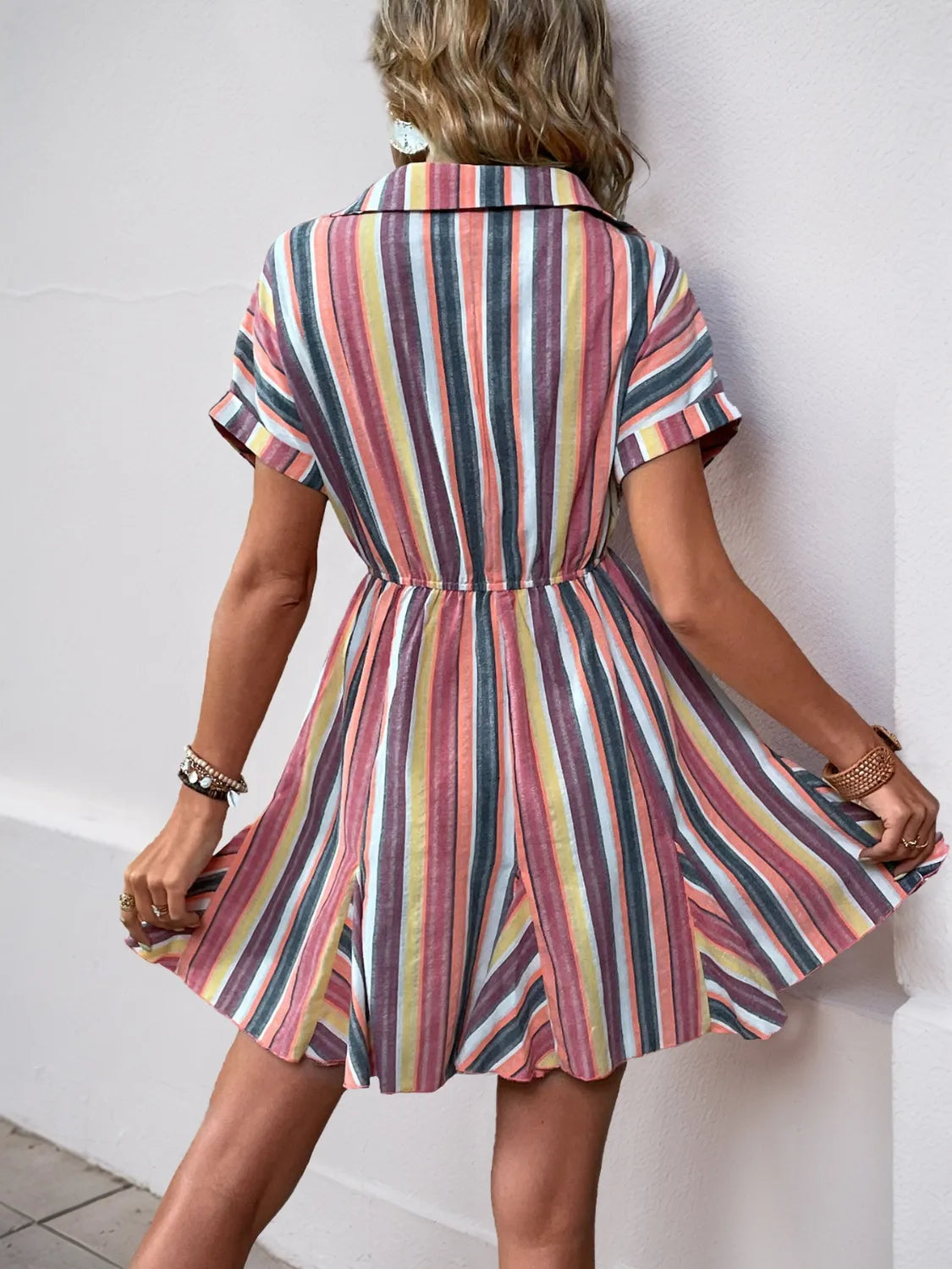 Striped surplice short-sleeve dress with multicolor vertical stripes and a cinched waist