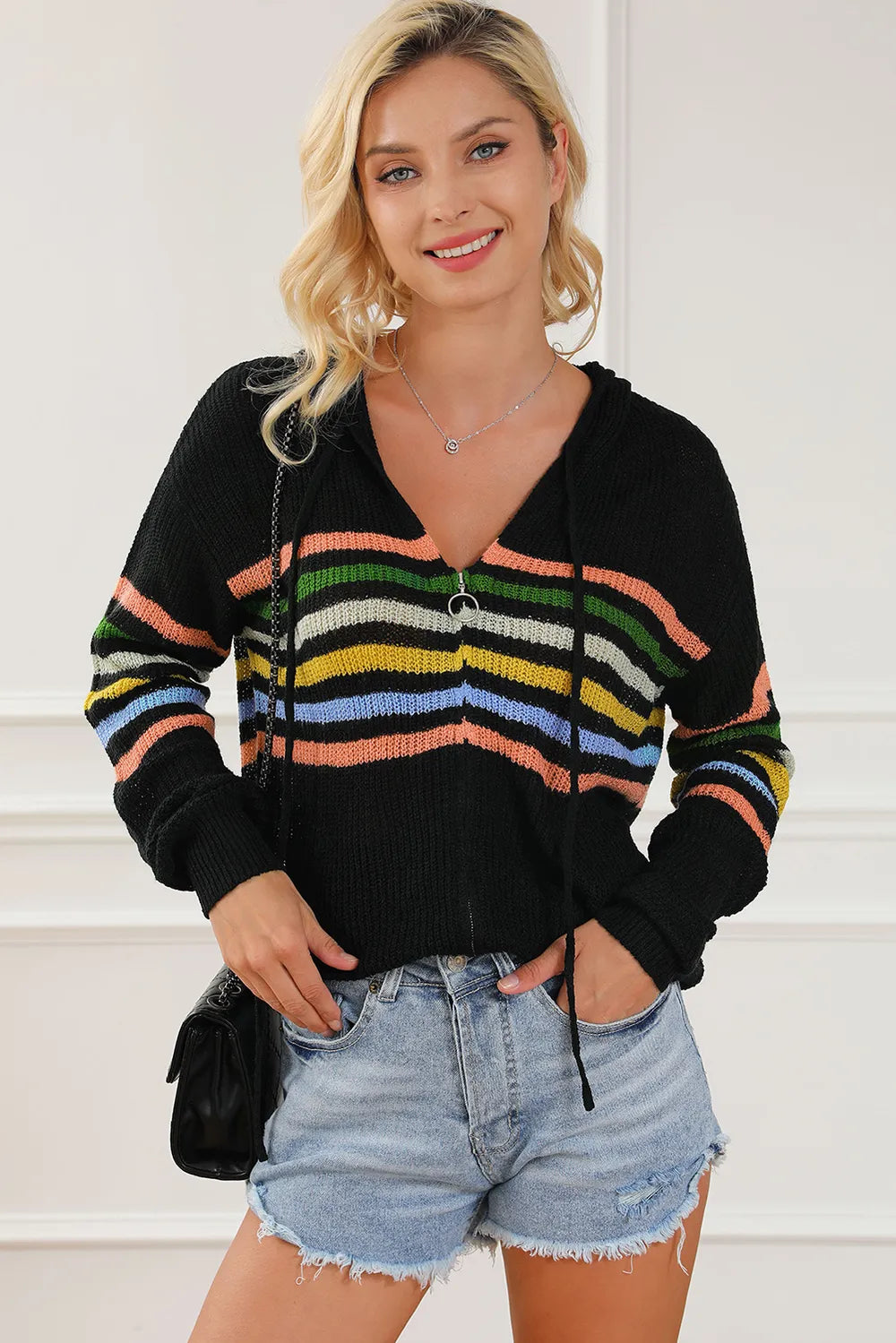 Black zip-up hooded sweater cardigan with multicolor horizontal stripes and ring zipper pull
