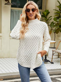 White mock neck knit sweater with long sleeves and textured diamond pattern