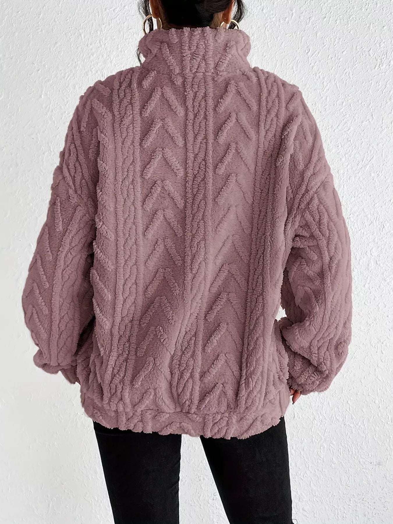 Light purple sherpa quarter-zip sweatshirt with cable knit texture, back view