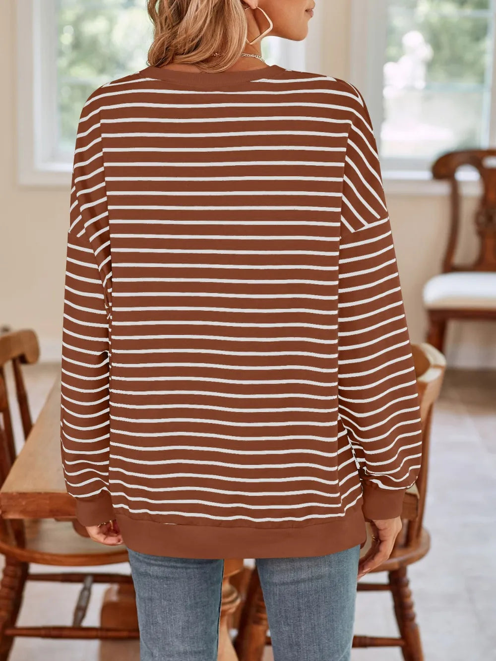 Back view of brown striped crew-neck long-sleeve sweatshirt with white lines
