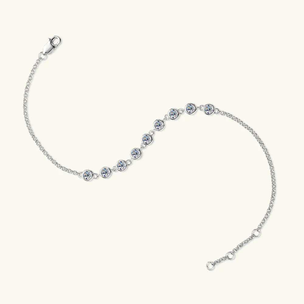 925 sterling silver bracelet with a curved row of round blue stones