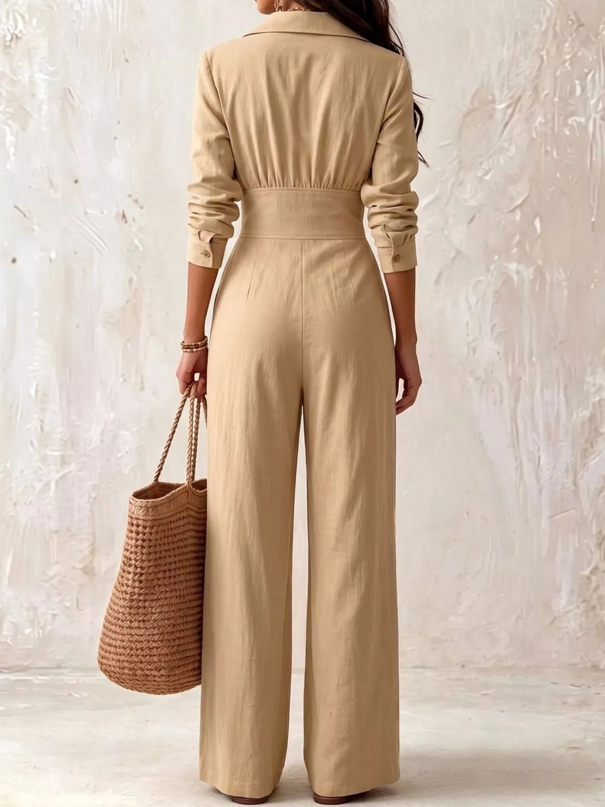 Tan wide-leg jumpsuit back view, long sleeves, cinched waist