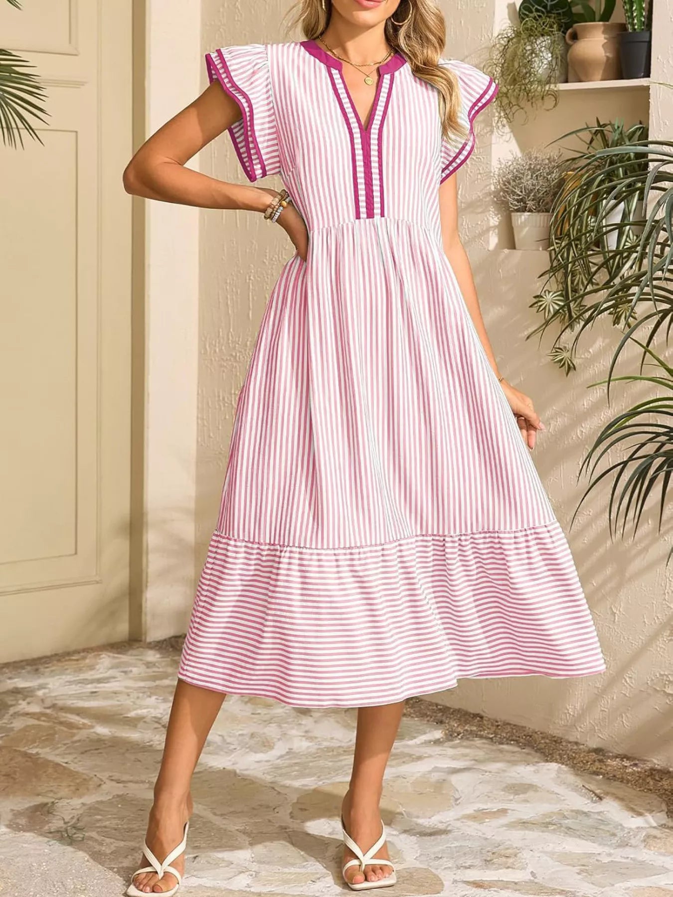 Pink-and-white striped midi dress with ruffle cap sleeves and V-neck trim