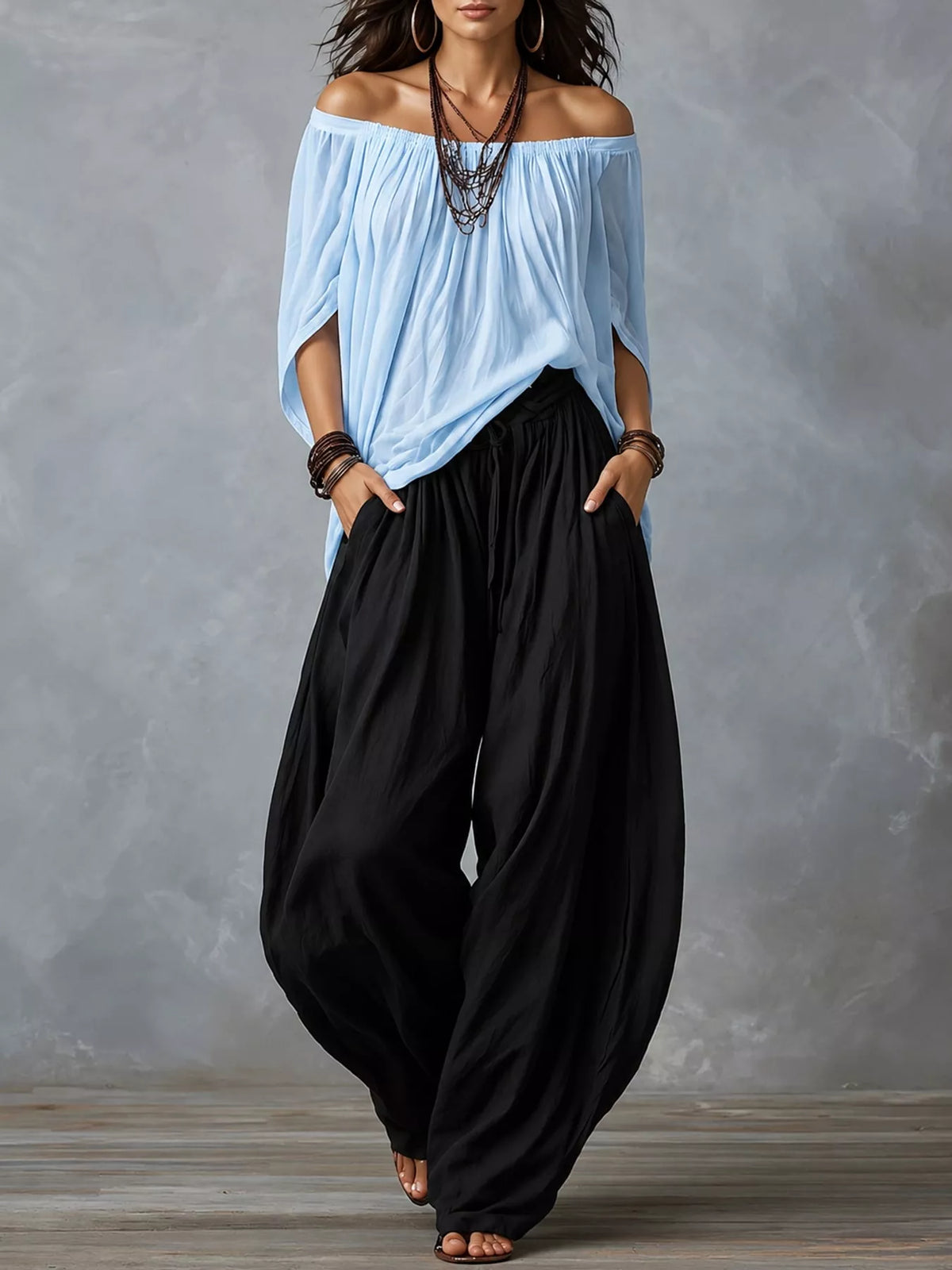 Off-shoulder harem pants set with light blue off-shoulder top and black gathered harem pants
