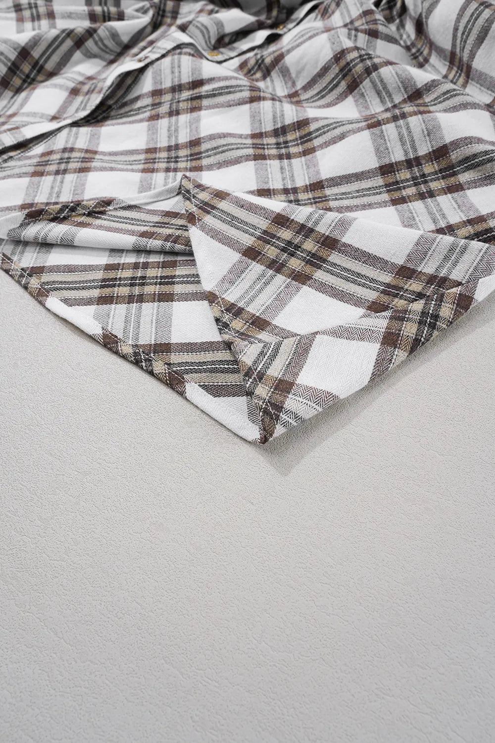 Plaid shirt dress fabric with gathered seams and textured weave