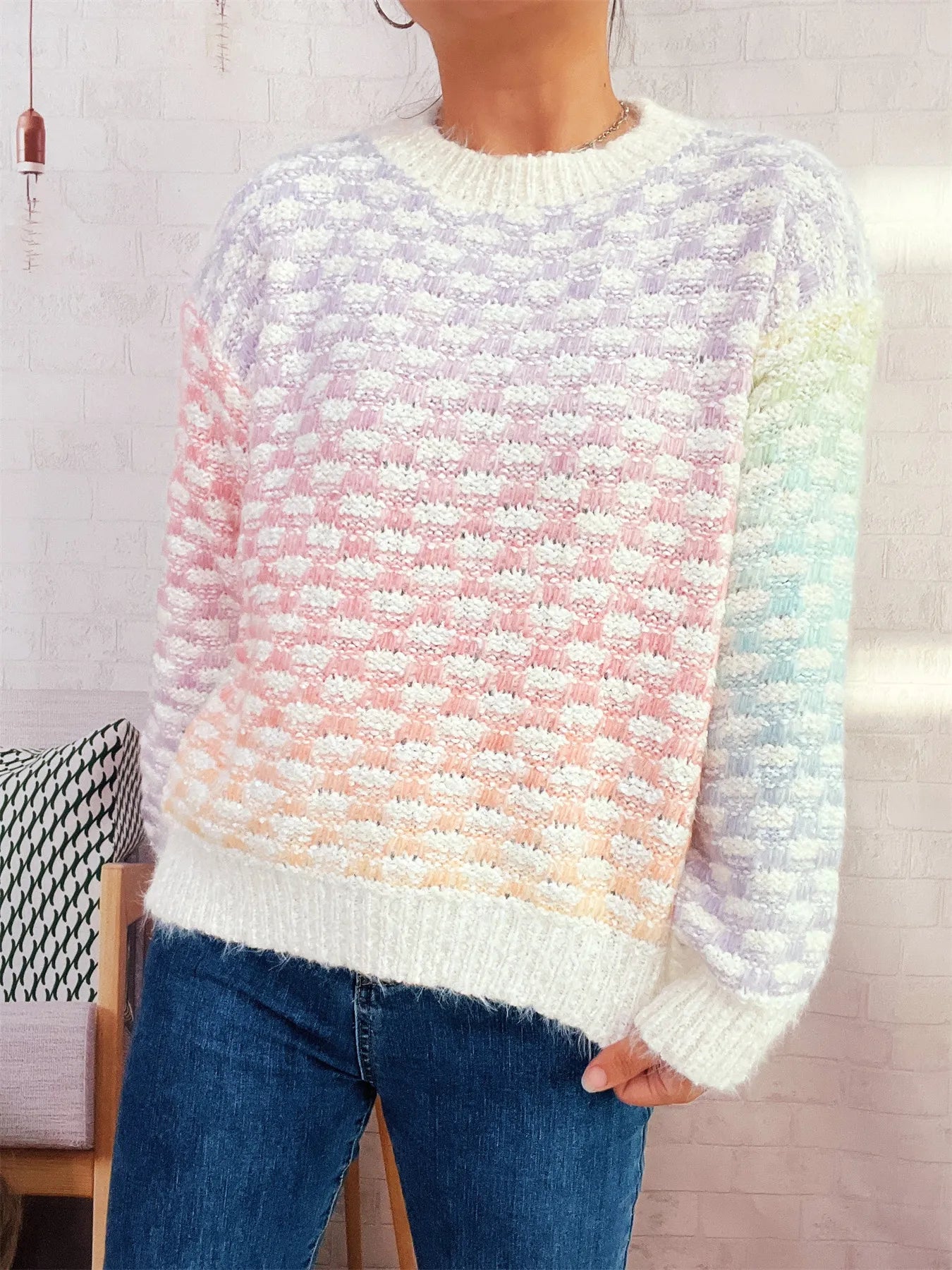 Rainbow gradient round neck sweater in soft pastels, textured knit with ribbed edges