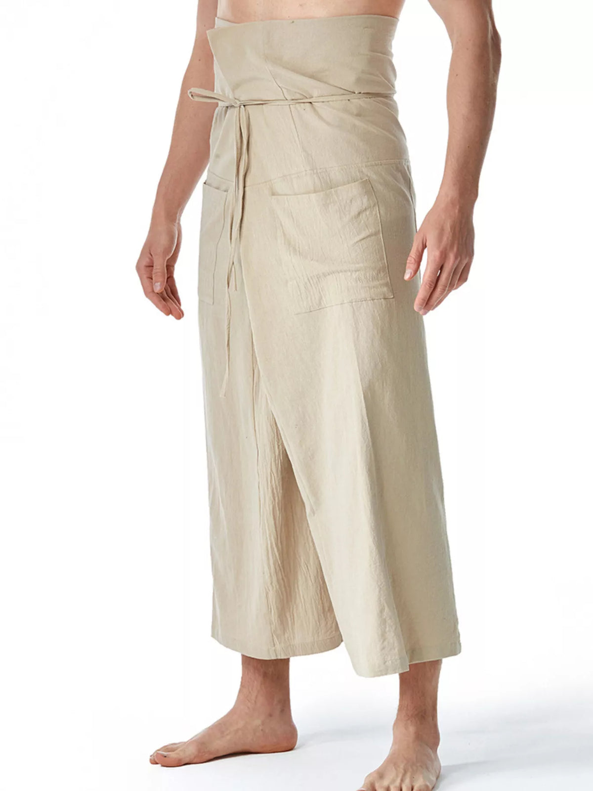 Men's loose-fit drawstring pants in light cream, front view with drawcord and wide leg.