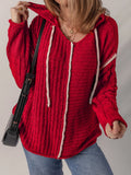 Deep red textured knit hooded sweater with contrast white trim and drawstring