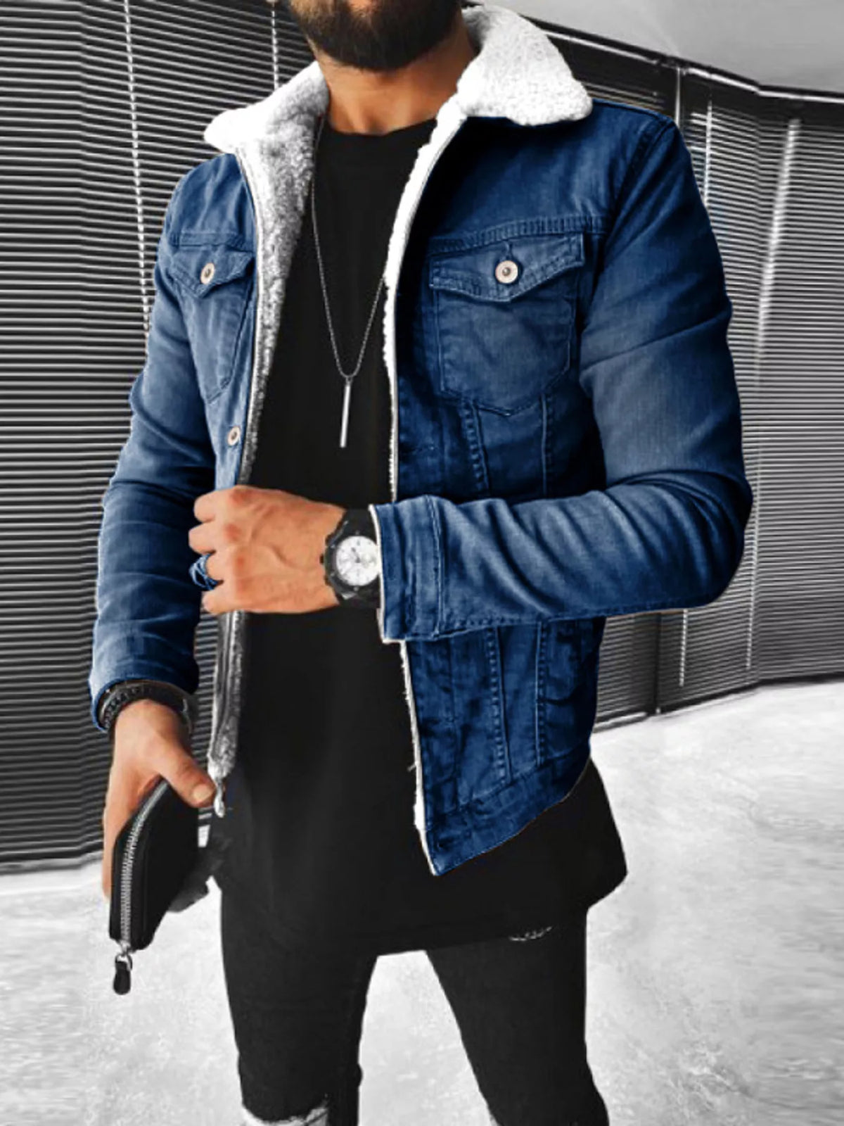 Dark blue denim jacket with sherpa lining, button front and chest pockets